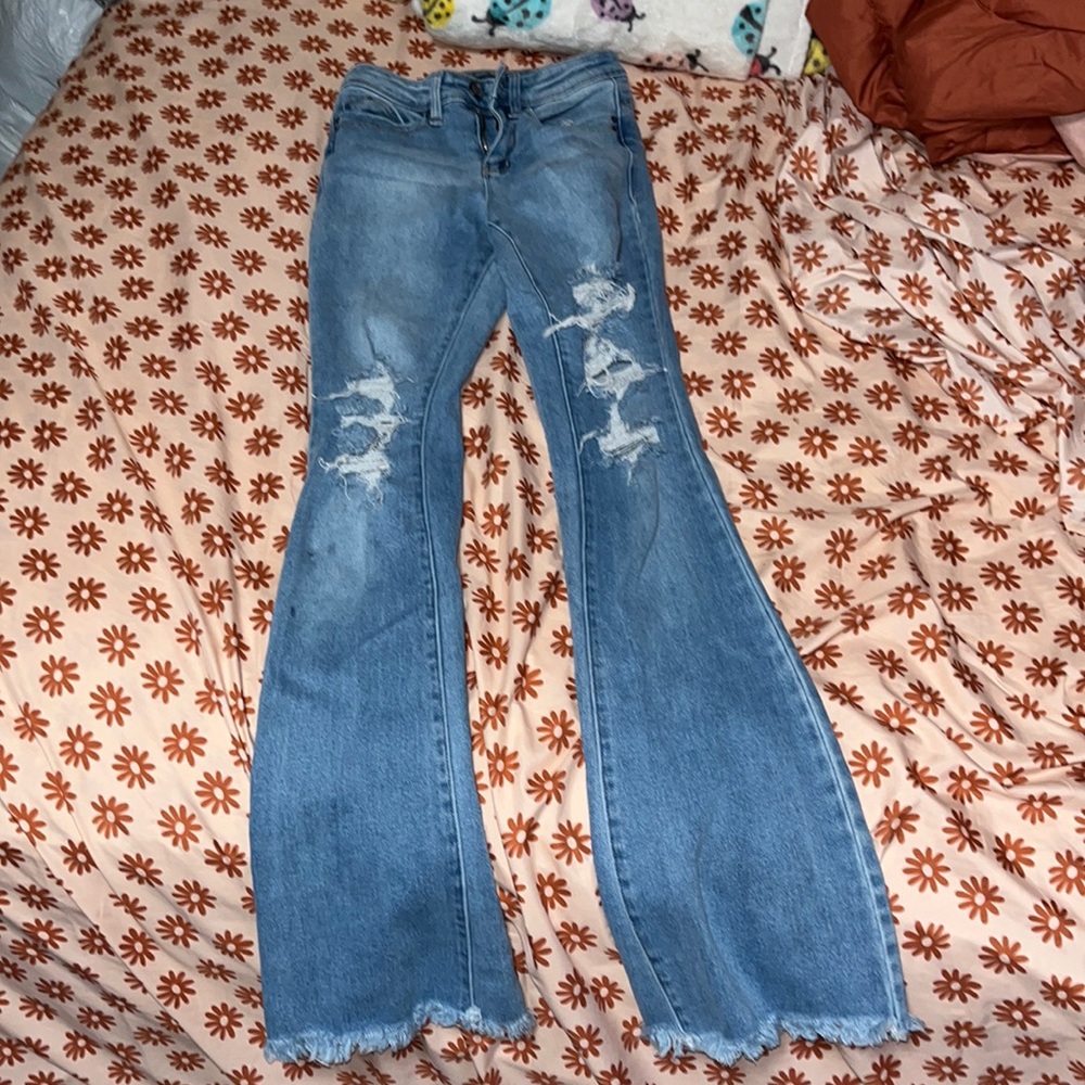 Fashio Nova ripped light flare jeans